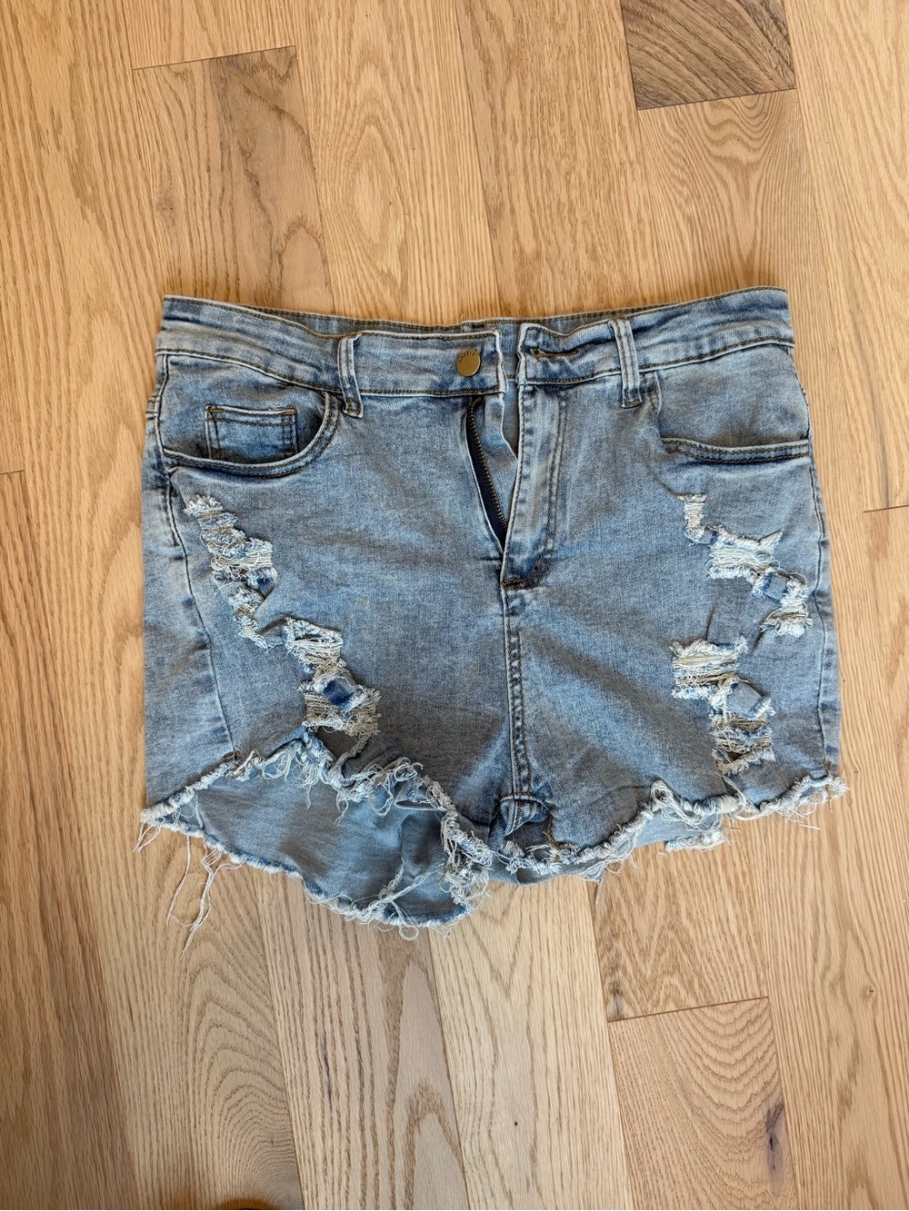 Women’s Distressed Light Blue Denim Shorts